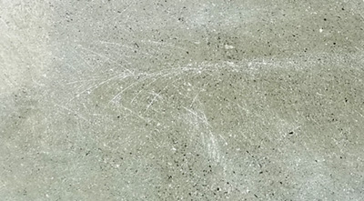 固化劑地坪施工如何消除打磨痕跡？